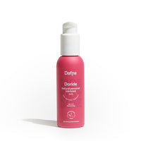 Lubrificante intimo Doride Dafne, alla vaniglia, naturale e a base d'acqua, in flacone magenta su sfondo bianco