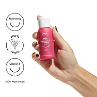 Olio massaggi Milo Dafne 50 ml, tenuto in mano, con icone su vitamina e, idratante, 100% vegano, Made in Italy