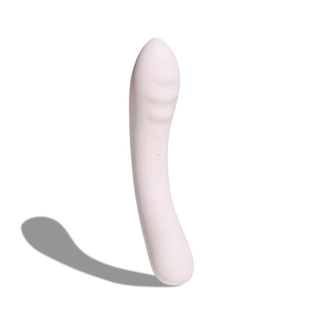 Vibratore multiuso Double Trouble nude in silicone, con forma ergonomica e dettagli scanalati, su sfondo bianco
