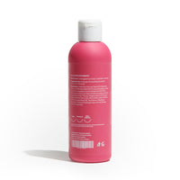 Olio massaggi Milo Dafne, flacone visto dal retro con etichetta ingredienti su sfondo bianco